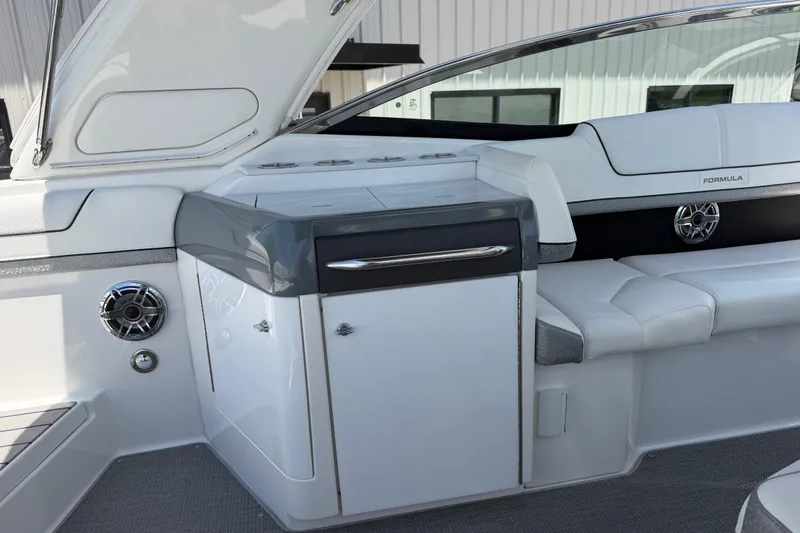Slide: The Image of 2022 Formula 310 Sun Sport boat interior with sleek seating and modern design. - 16