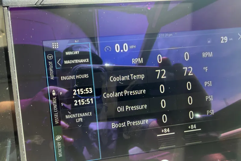 Slide: The Image of Dashboard of a 2022 Formula 310 Sun Sport showing engine metrics and maintenance data. - 28