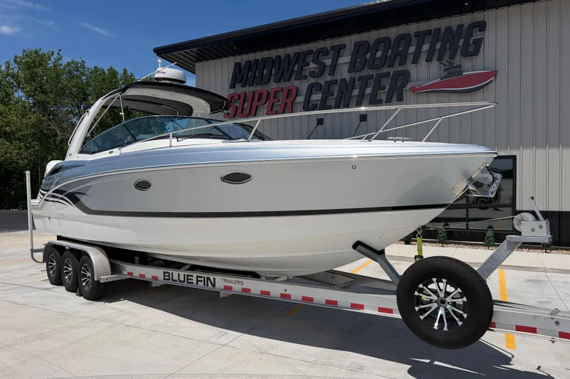 Slide: The Image of 2022 Formula 310 Sun Sport boat on trailer at Midwest Boating Center. - 3
