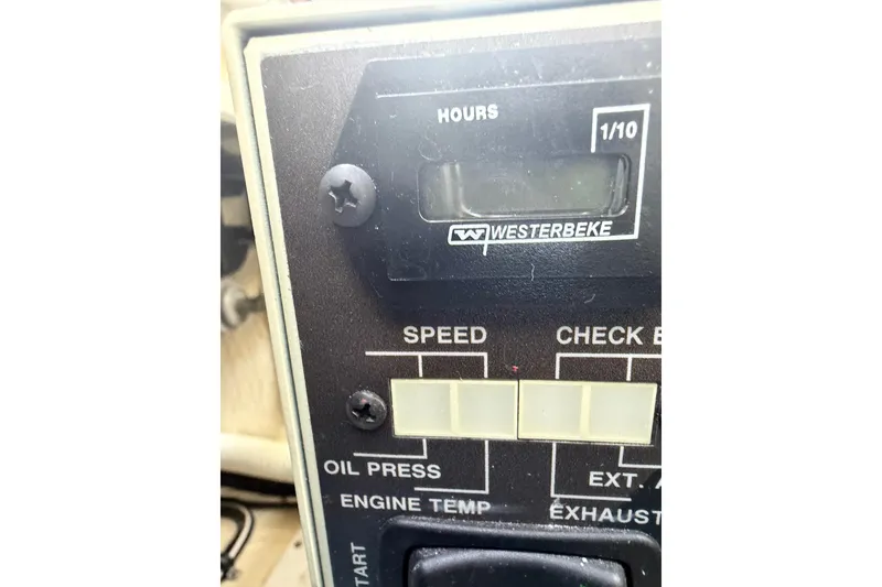Slide: The Image of Control panel of a 2022 Formula 310 Sun Sport boat, featuring Westerbeke hour meter. - 30