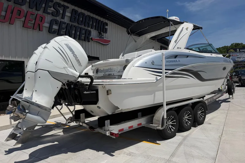 Slide: The Image of 2022 Formula 310 Sun Sport boat on trailer at Midwest Boating Center. - 4