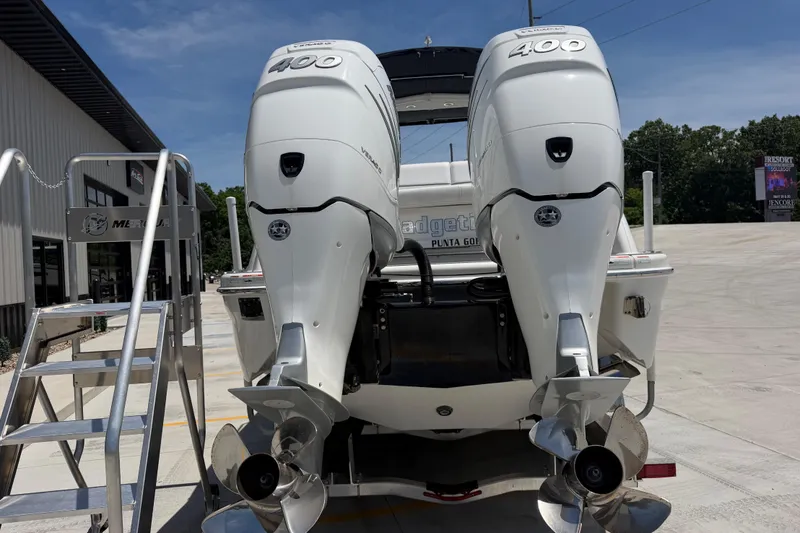 Slide: The Image of Rear view of 2022 Formula 310 Sun Sport with twin Mercury 400 outboard engines. - 5