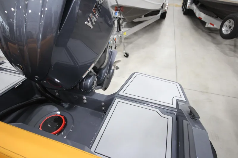 Slide: The Image of 2026 IRON BOATS IRON 767 with Yamaha engine, displayed in a showroom. - 11