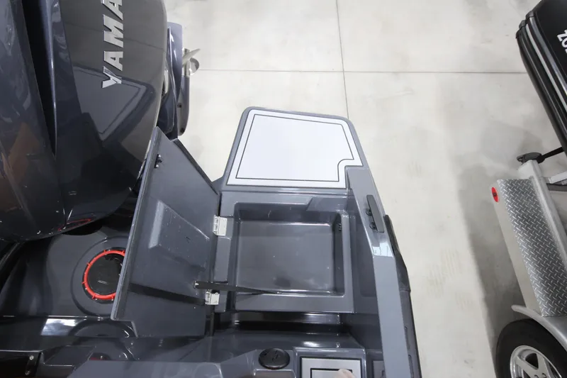 Slide: The Image of 2026 IRON BOATS IRON 767 with Yamaha engine, featuring open storage compartment. - 12