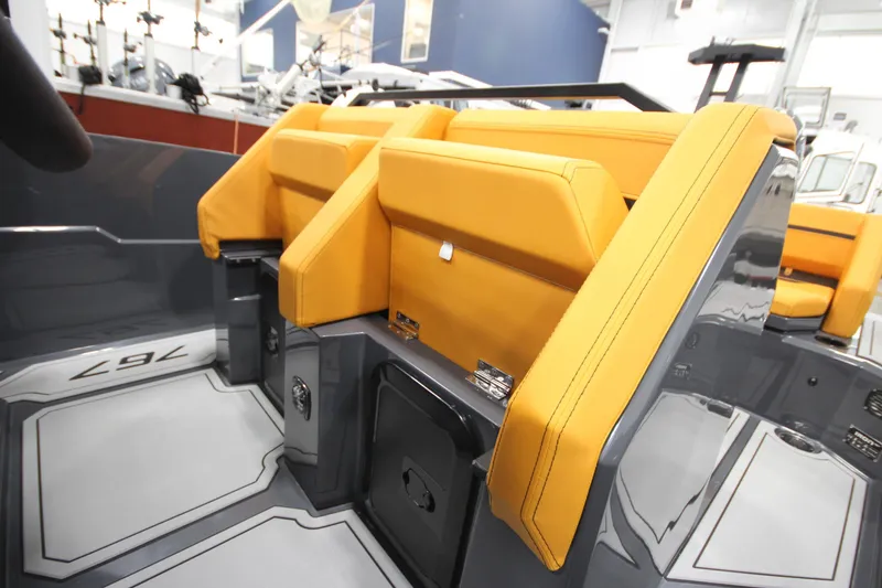 Slide: The Image of Interior view of 2026 IRON BOATS IRON 767 with orange seating and sleek design. - 19