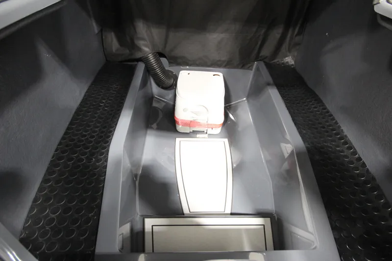 Slide: The Image of Interior view of 2026 IRON BOATS IRON 767, showcasing storage compartment and flooring. - 24