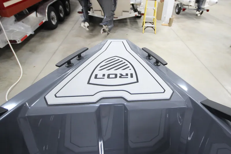 Slide: The Image of Bow of 2026 IRON BOATS IRON 767 in a showroom setting. - 28