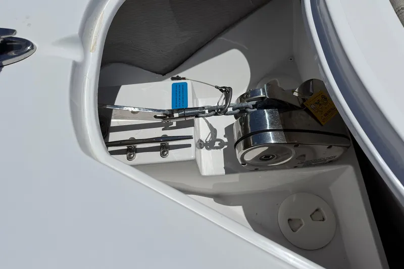 Slide: The Image of Anchor compartment of 2021 Sportsman Open 252 Center Console boat. - 16