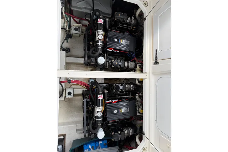 Slide: The Image of Twin MerCruiser engines in a 1997 Bayliner 3255 Avanti boat engine compartment. - 10