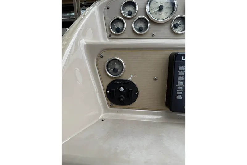 Slide: The Image of Control panel of a 1997 Bayliner 3255 Avanti boat with gauges and switches. - 22