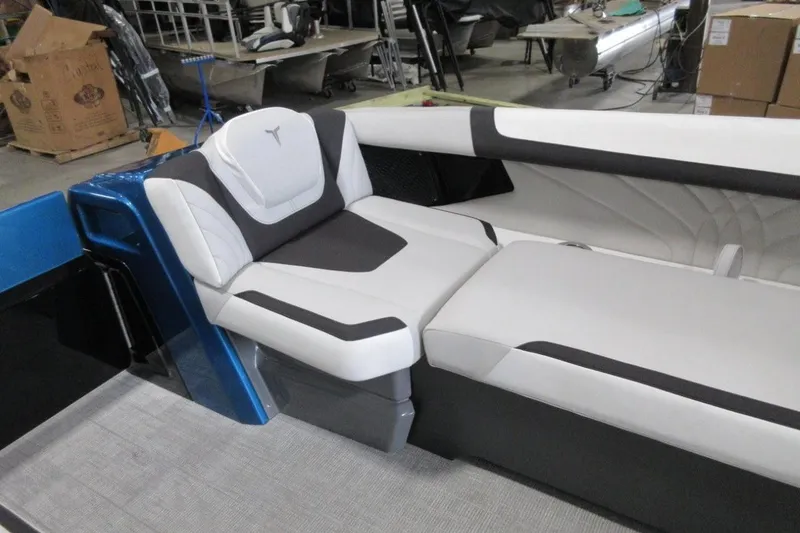 Slide: The Image of 2026 Tahoe boat interior with sleek white and black seating, modern design. - 14