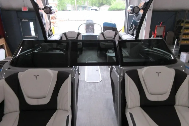 Slide: The Image of Interior view of a 2026 Tahoe boat with sleek seating and modern design. - 20