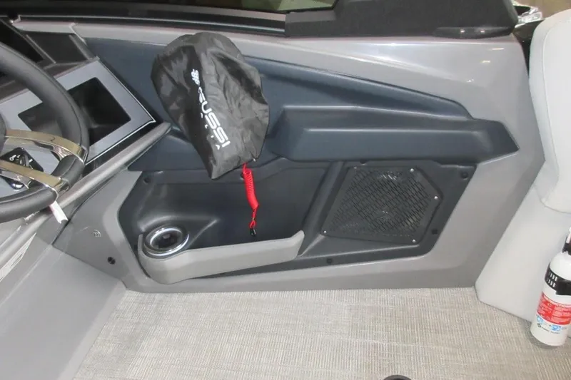 Slide: The Image of Interior of 2026 Tahoe vehicle with steering wheel, speaker, and safety equipment. - 22