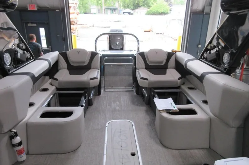 Slide: The Image of Interior of a 2026 Tahoe boat with plush seating and modern design. - 24