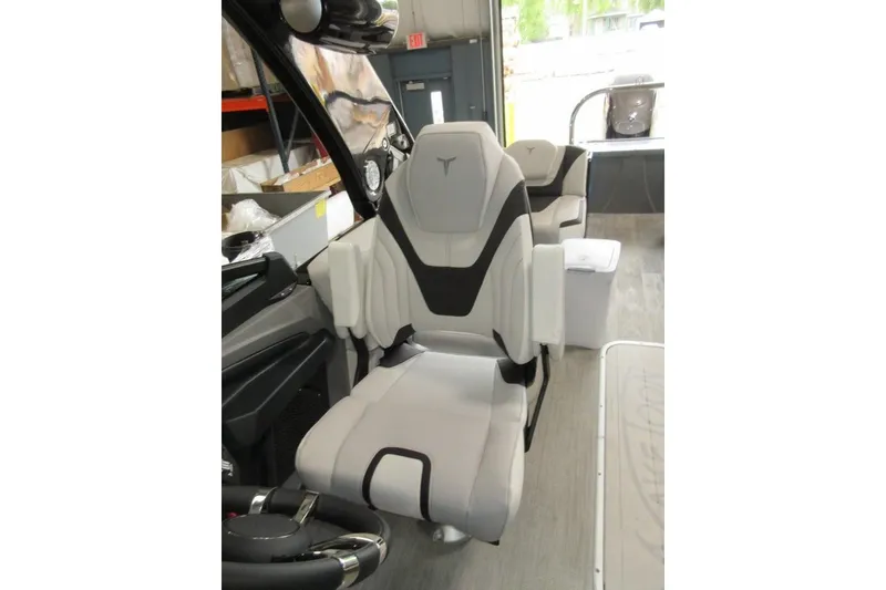 Slide: The Image of 2026 Tahoe boat interior with modern, ergonomic seating and sleek design. - 26