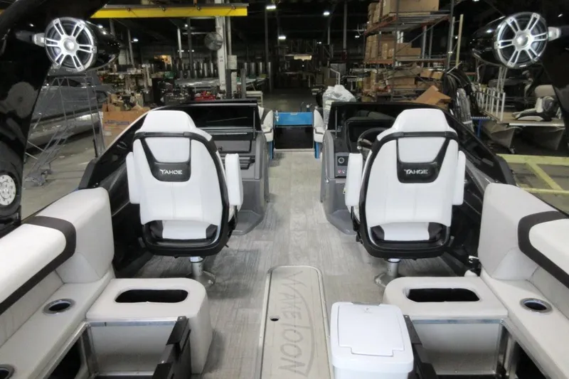 Slide: The Image of Interior of a 2026 Tahoe boat with modern seating and audio system. - 27
