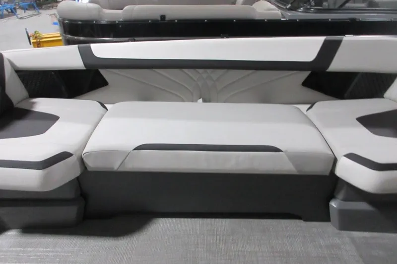 Slide: The Image of 2026 Tahoe boat interior with modern gray seating and black accents. - 28
