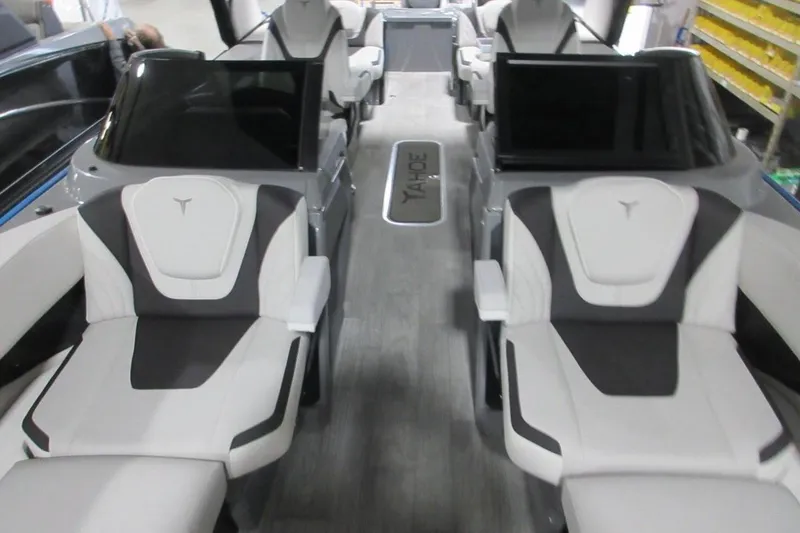 Slide: The Image of Luxurious 2026 Tahoe boat interior with modern seating and sleek design. - 29