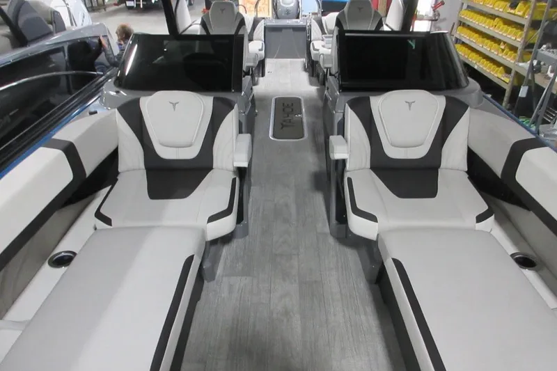 Slide: The Image of 2026 Tahoe boat interior with modern seating and sleek design. - 30