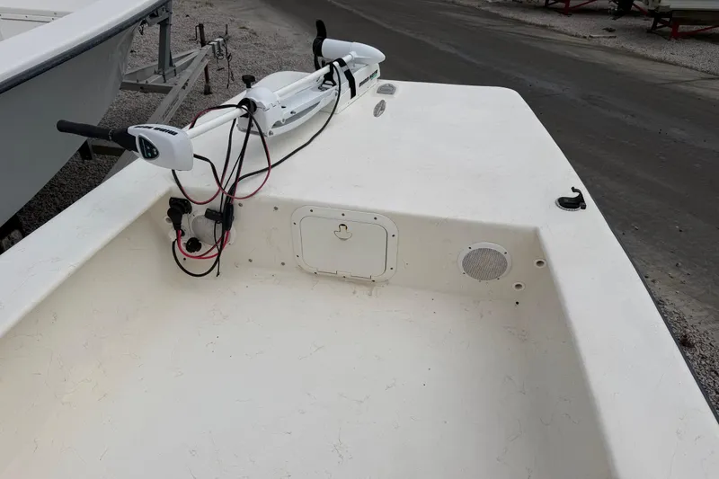 Slide: The Image of 2006 Jones Brothers Bateau 17 boat deck with trolling motor and storage compartment. - 11