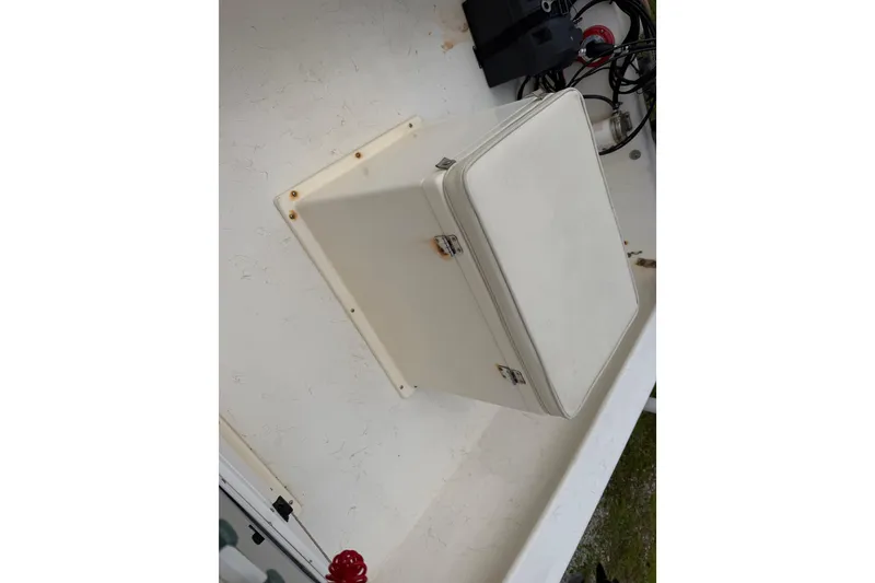 Slide: The Image of Storage compartment on a 2006 Jones Brothers Bateau 17 boat deck. - 13