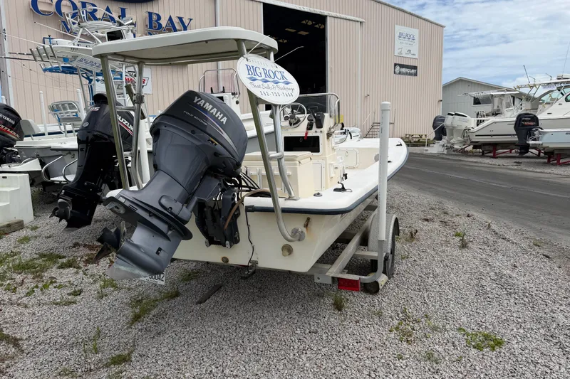 Slide: The Image of 2006 Jones Brothers Bateau 17 boat with Yamaha outboard motor on a trailer at Coral Bay. - 5