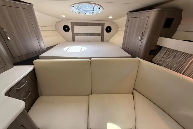 Slide: The Image of Luxurious interior of 2022 Regal 33 XO yacht with modern furnishings and elegant design. - 19