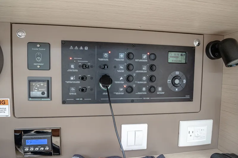 Slide: The Image of Control panel of Beneteau Oceanis 38.1 yacht, year 2023. - 12