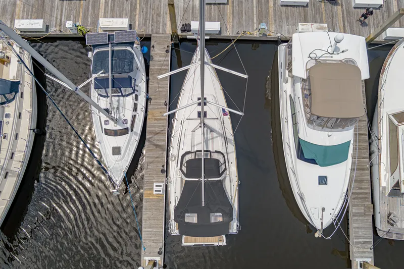 Slide: The Image of Aerial view of a 2023 Beneteau Oceanis 38.1 yacht docked in marina. - 15