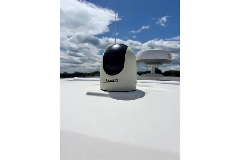 Slide: The Image of Rooftop camera on 2020 Protector 380 Targa boat under cloudy sky. - 29