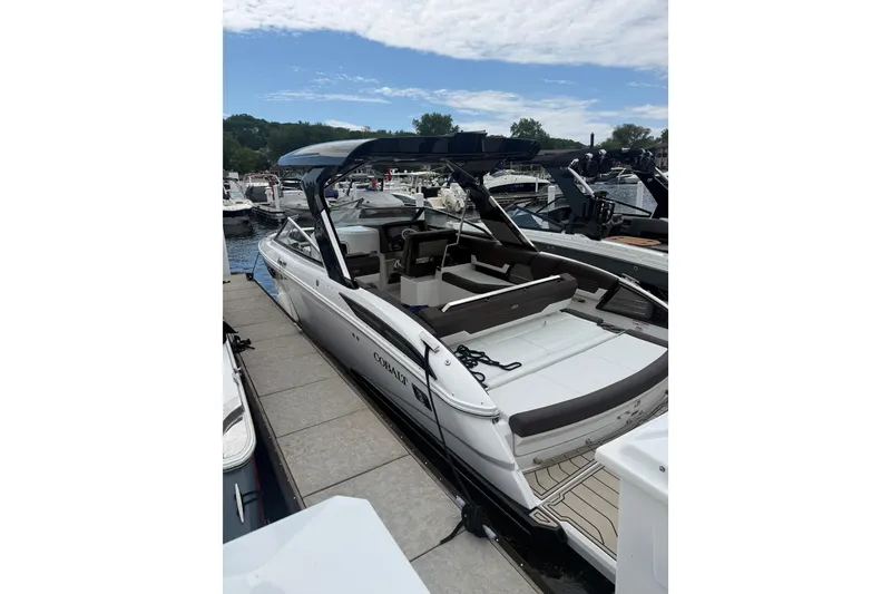 The Image of 2025 Cobalt A29 boat docked, featuring sleek design and spacious seating. - 0