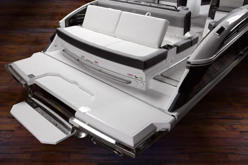 Slide: The Image of Manufacturer Provided Image: 2025 Cobalt A29 boat with sleek white seating and modern design on wooden deck. - 12