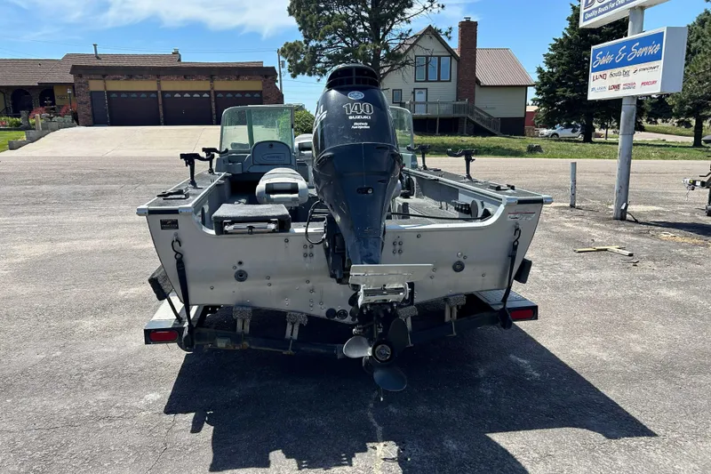 Slide: The Image of 2007 Alumacraft Dominator 175 Sport boat with Suzuki 140 outboard motor on trailer. - 9