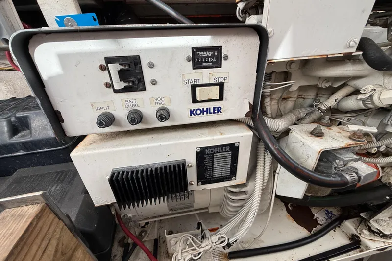 Slide: The Image of Control panel of a 1995 Harbor Master 52 Wide Body boat with Kohler generator. - 30
