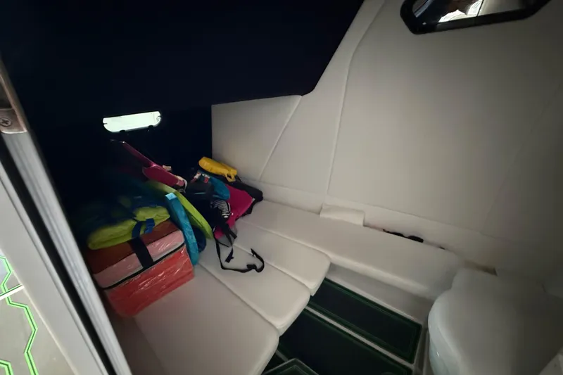 Slide: The Image of Interior cabin of 2024 Sunsation 32 CCX boat with seating and storage. - 11