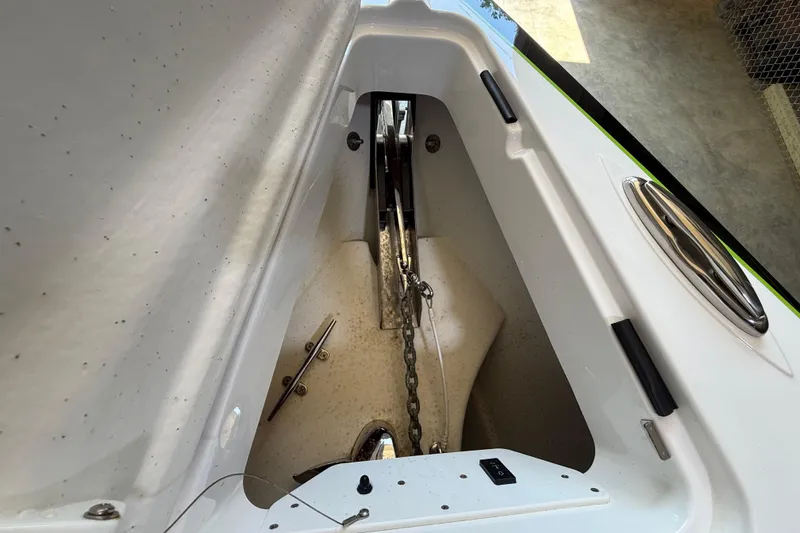 Slide: The Image of 2024 Sunsation 32 CCX anchor compartment with chain and cleat details. - 13