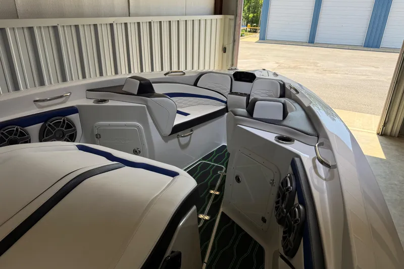 Slide: The Image of 2024 Sunsation 32 CCX boat interior with modern seating and audio system. - 6
