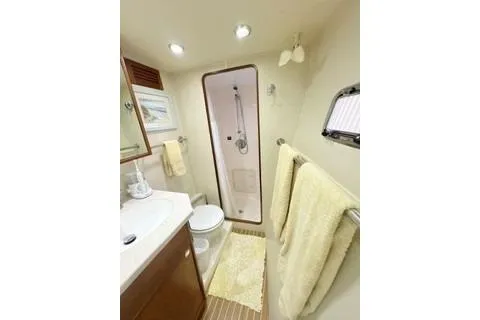 Slide: The Image of Bathroom interior of 2006 Endeavour 44 TrawlerCat with shower, sink, and toilet. - 21