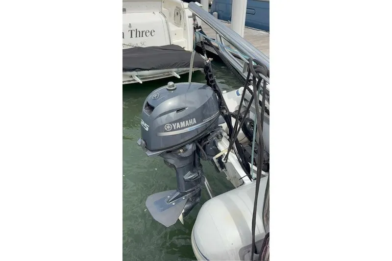 Slide: The Image of Yamaha 25 outboard motor on 2006 Endeavour 44 TrawlerCat, docked in marina. - 29