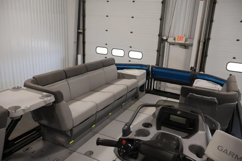 Slide: The Image of 2023 Sea-Doo Switch Cruise 21 interior with spacious seating and modern controls. - 11