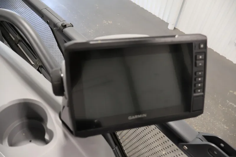 Slide: The Image of Garmin display on 2023 Sea-Doo Switch Cruise 21 dashboard, featuring cup holder. - 20