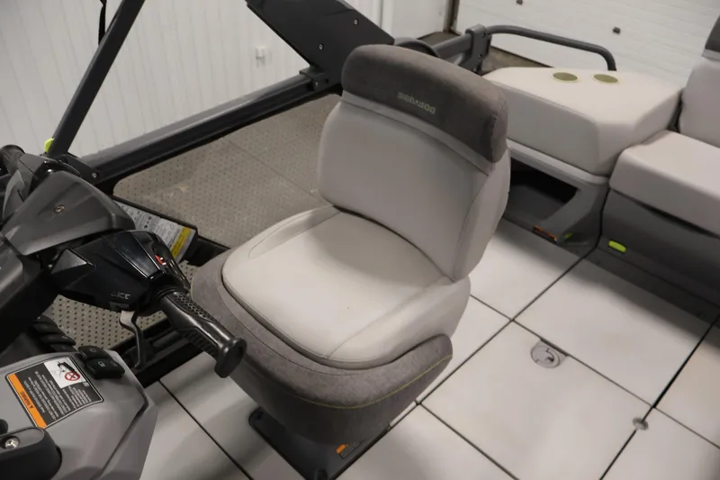 Slide: The Image of 2023 Sea-Doo Switch Cruise 21 interior with steering and seating area. - 23