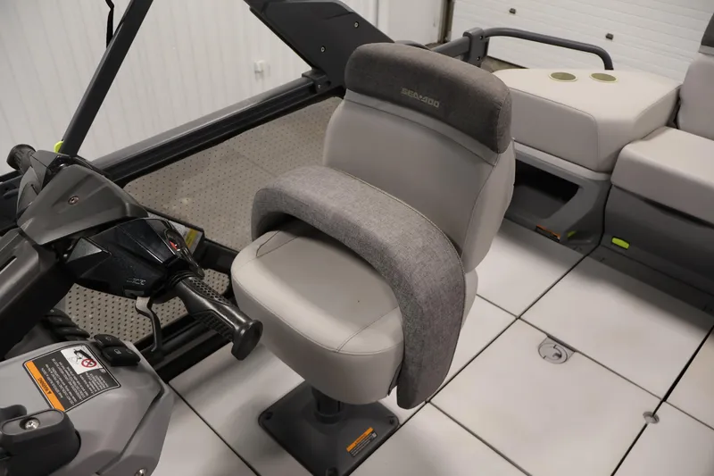 Slide: The Image of 2023 Sea-Doo Switch Cruise 21 interior with steering and seating details. - 24