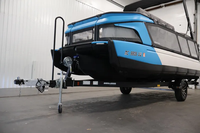 Slide: The Image of 2023 Sea-Doo Switch Cruise 21 on trailer in indoor setting. - 33