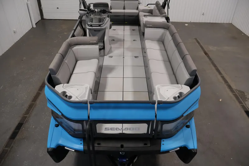 Slide: The Image of 2023 Sea-Doo Switch Cruise 21 pontoon boat with spacious seating and modern design. - 9