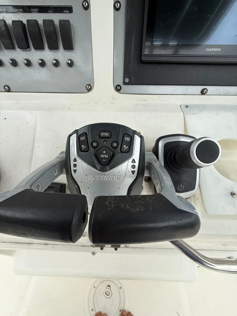Slide: The Image of Control console of a 1998 Century 3000 boat. - 11