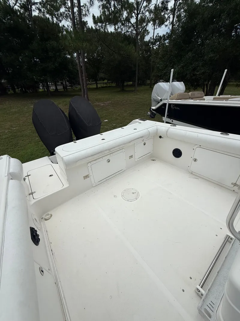 Slide: The Image of Interior of a 1998 Century 3000 boat with dual engines. - 12