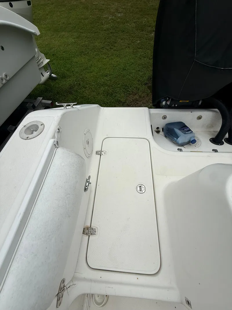 Slide: The Image of Interior of a 1998 Century 3000 boat with storage compartment. - 17