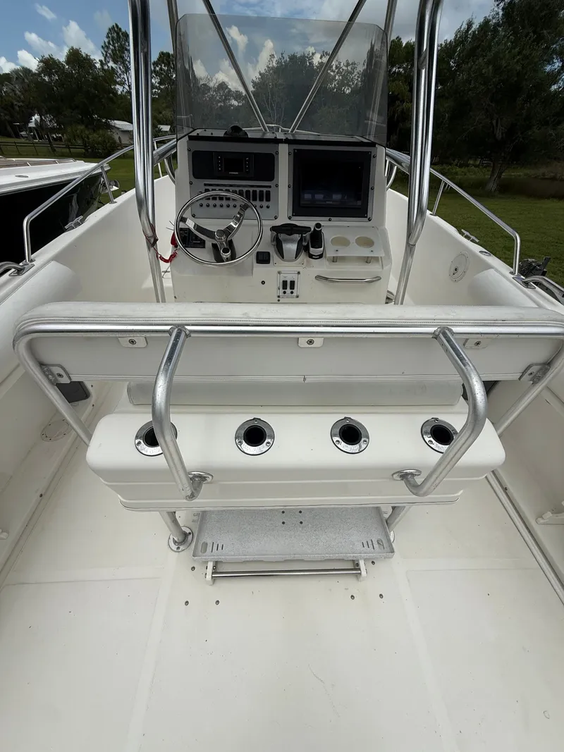 Slide: The Image of Interior view of a 1998 Century 3000 boat with control console. - 19
