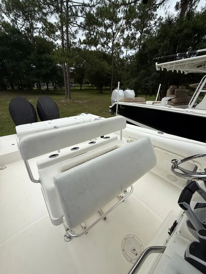 Slide: The Image of Interior of a 1998 Century 3000 boat with white seating. - 5